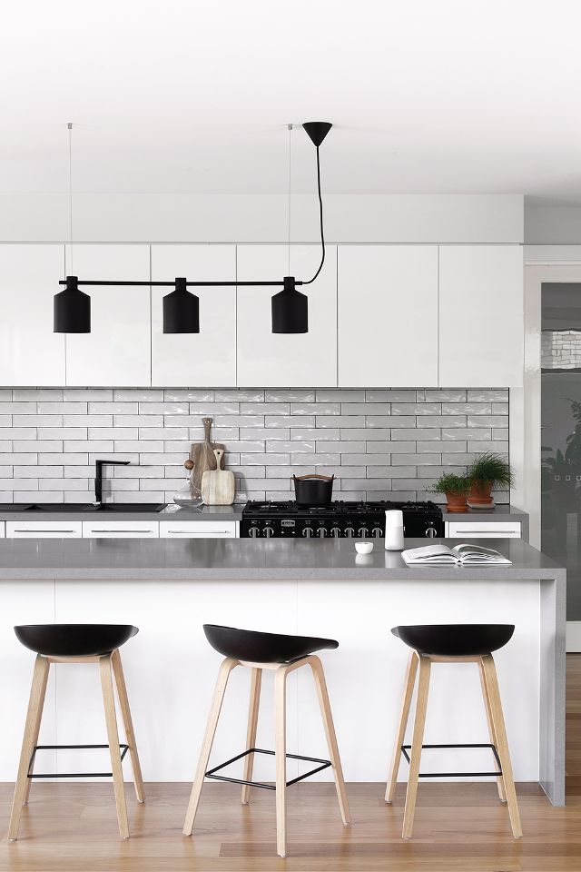 Black and white kitchen with bar stools