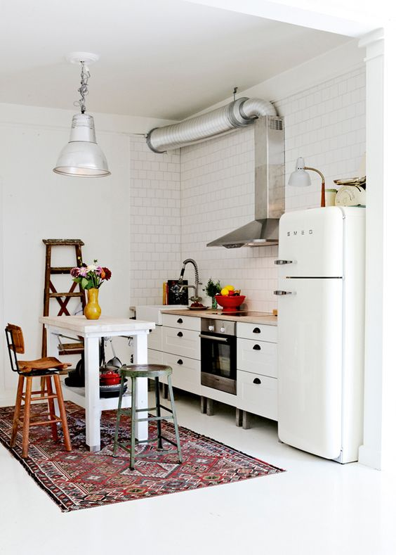 Vintage kitchen with colorful rug
