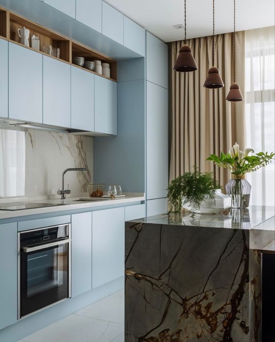 Blue kitchen cabinets with marble