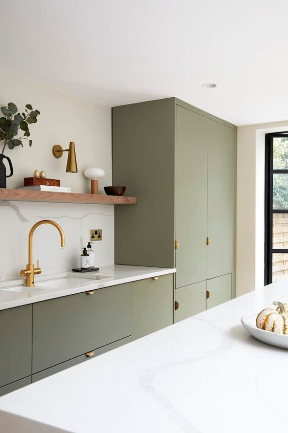 Green kitchen interior design with more light