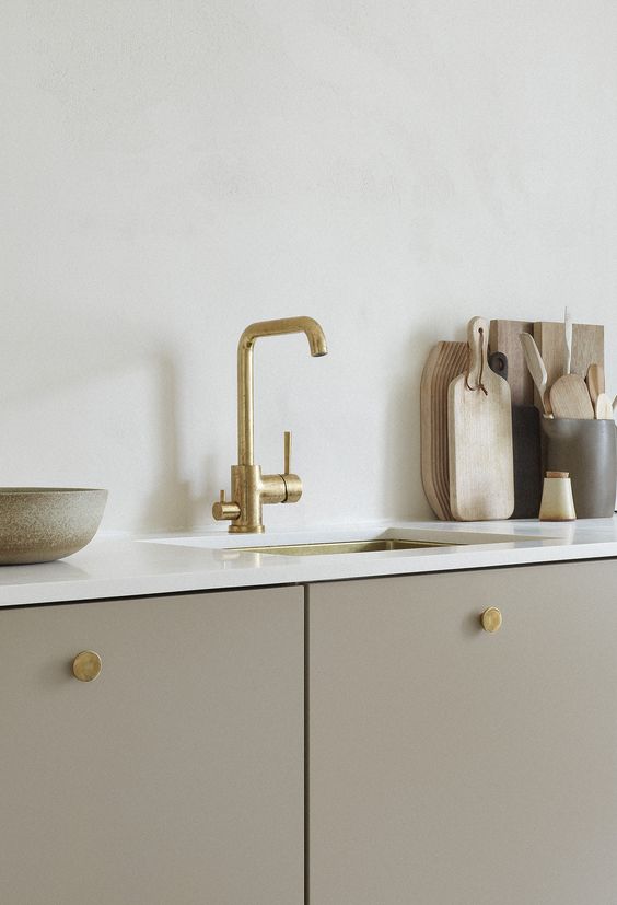 Golden handles for kitchen cabinets