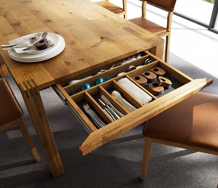 Dining table with built in storage