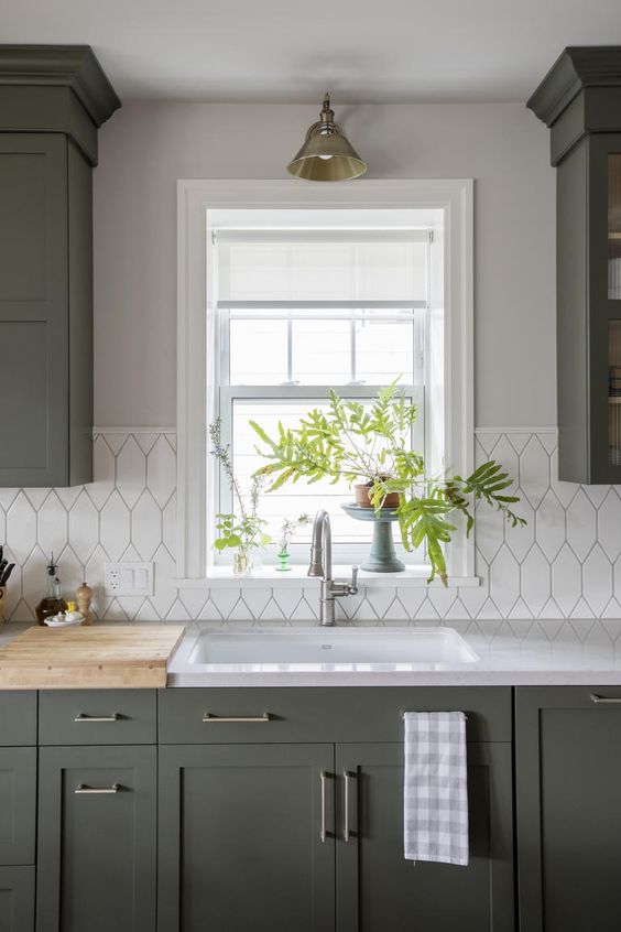 Mosaic subway tile and painted cabinets