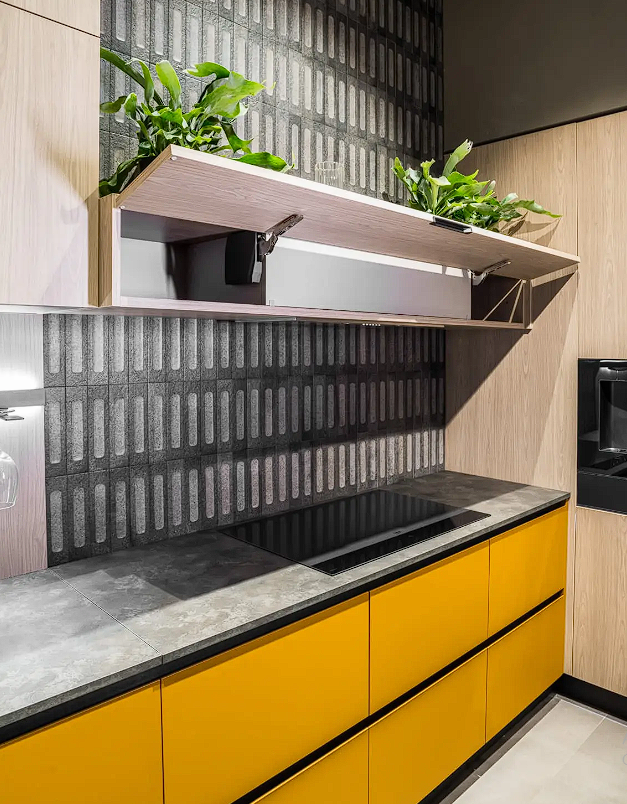 Kitchen with yellow cabinets without cabinet hardware