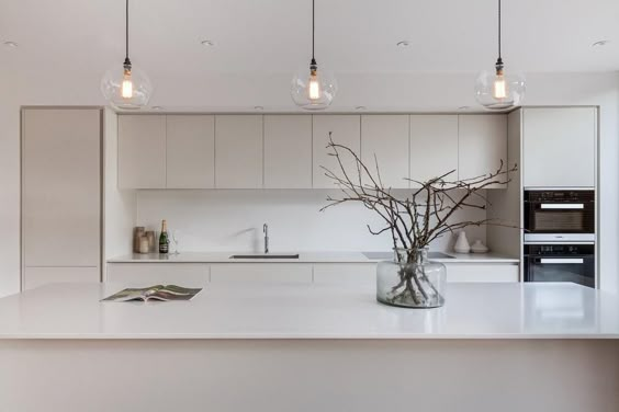 Kitchen with glass pendants