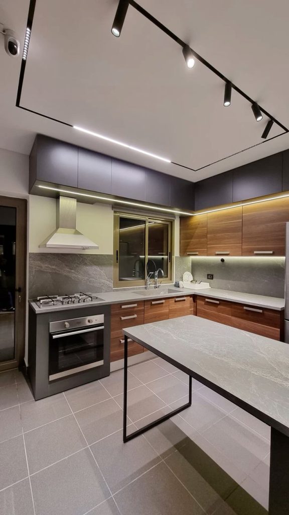 Modern kitchen with linear lighting