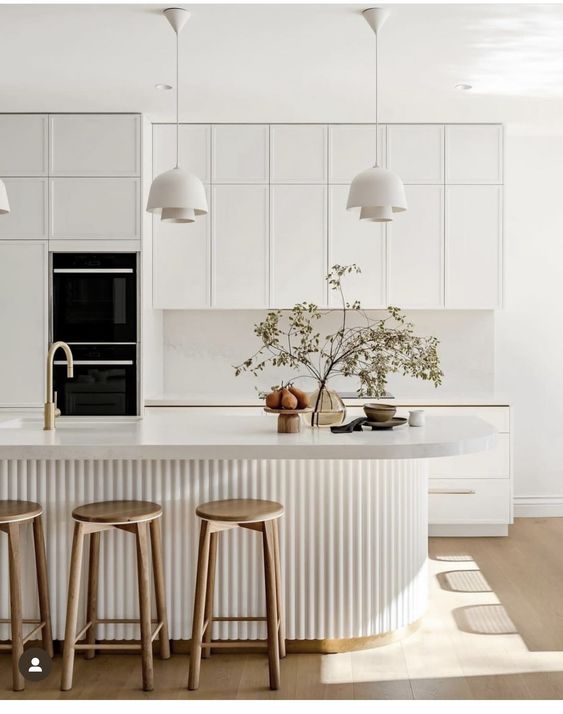 White kitchen design with more light and energy efficient pendant light